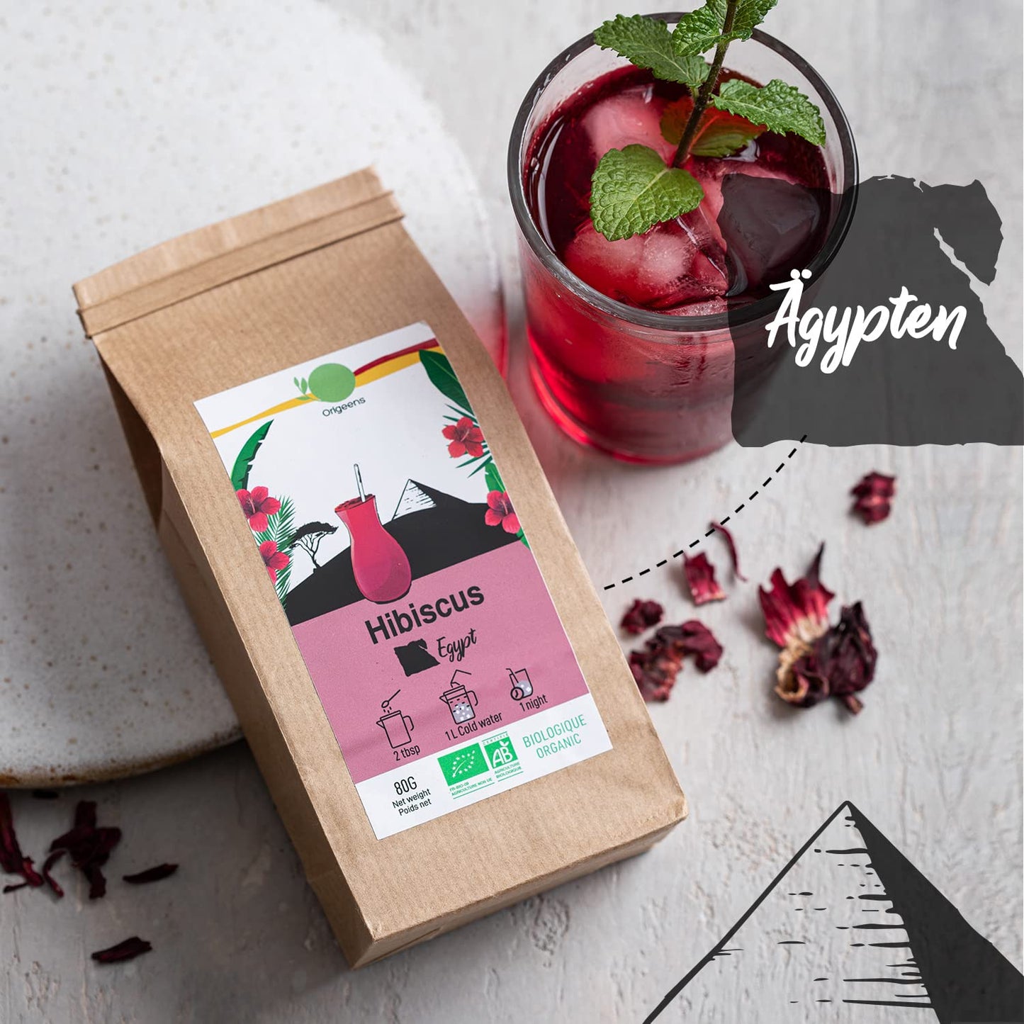 ORIGEENS BIO TEE GESCHENKSET „GETRÄNKE AUS ALLER WELT“ - Hibiskustee, Mate, Chai Tee, Genmaicha Grüntee - Tee Set 4X80G